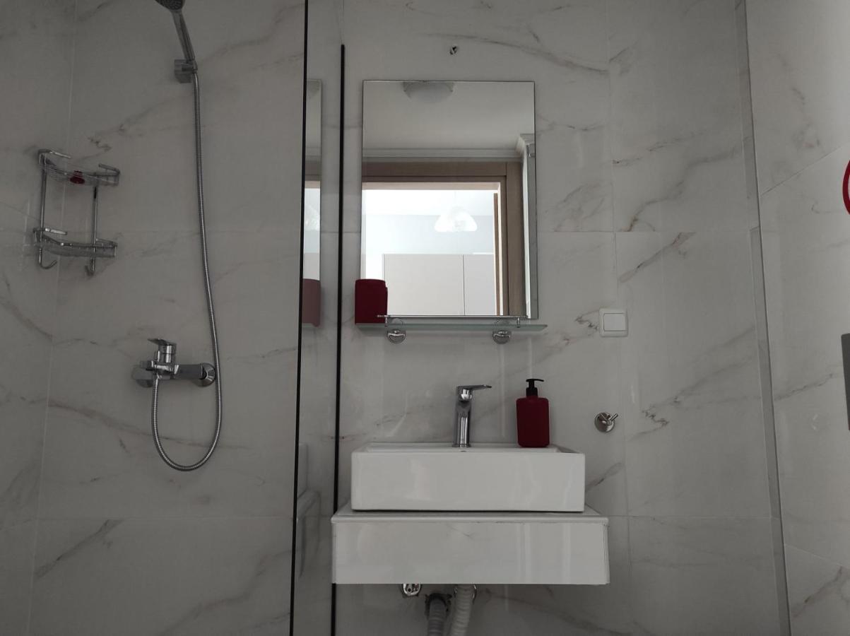 Blue Beach Apartments Ofrinion Bagian luar foto